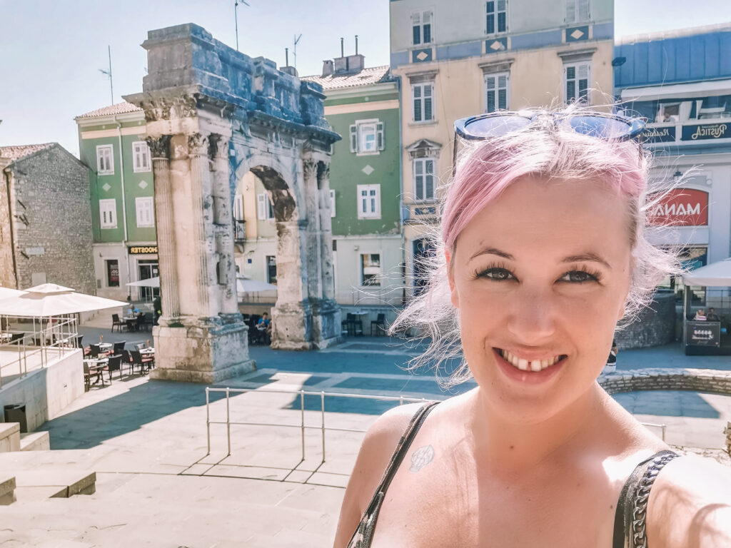 jj at the Arch of the Sergii in Pula Croatia